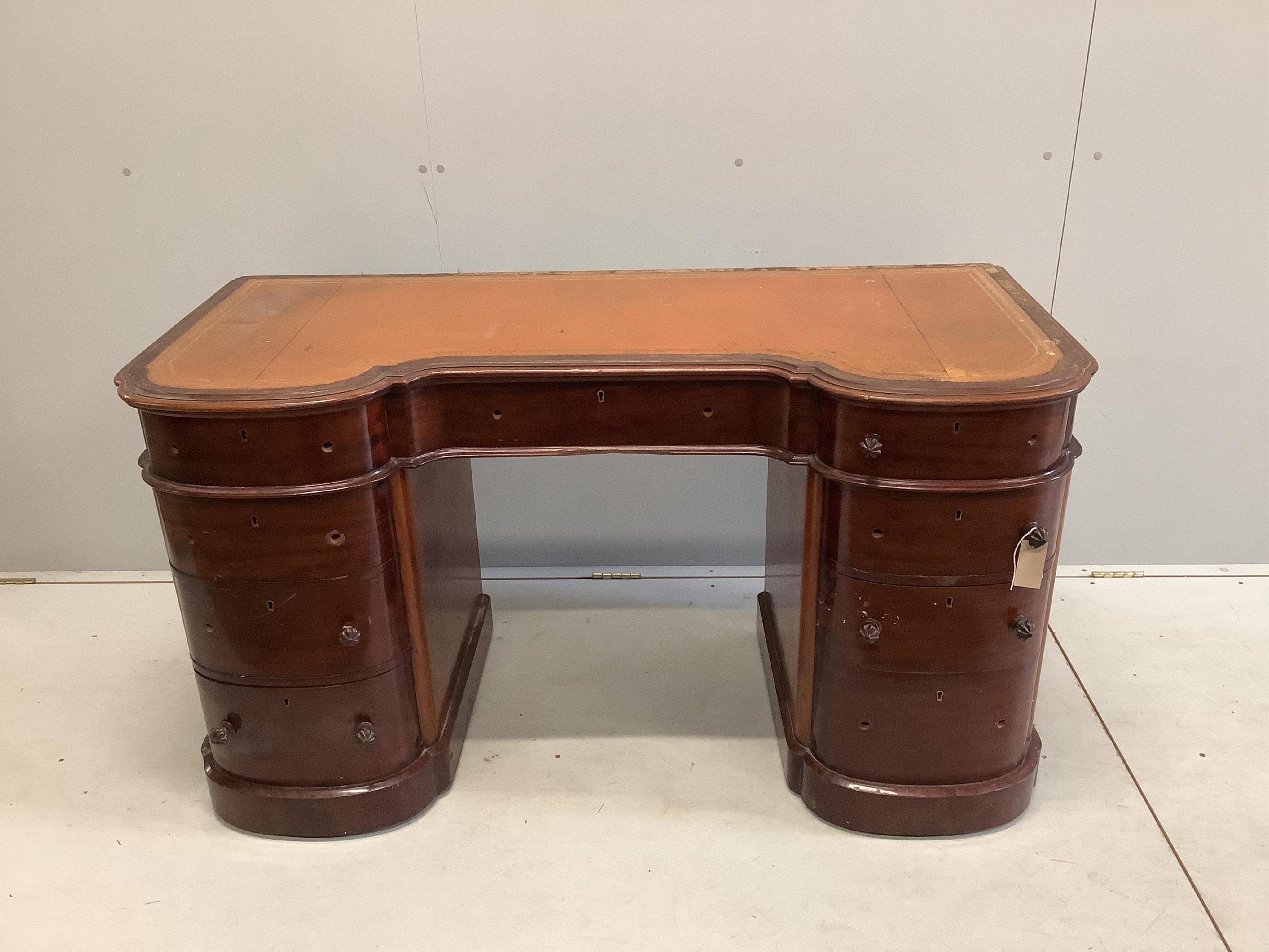 A Victorian mahogany bow front pedestal desk, width 138cm, depth 62cm, height 76cm. Condition - poor